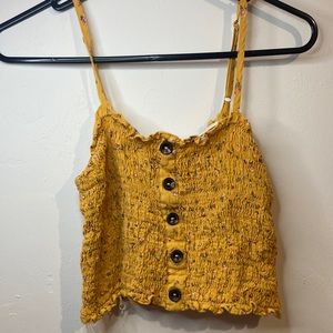 Cropped yellow tank top with buttons